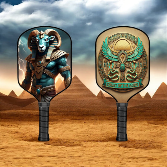 Pickleball paddle with teal-blue Khnum god graphic, black grip and face.