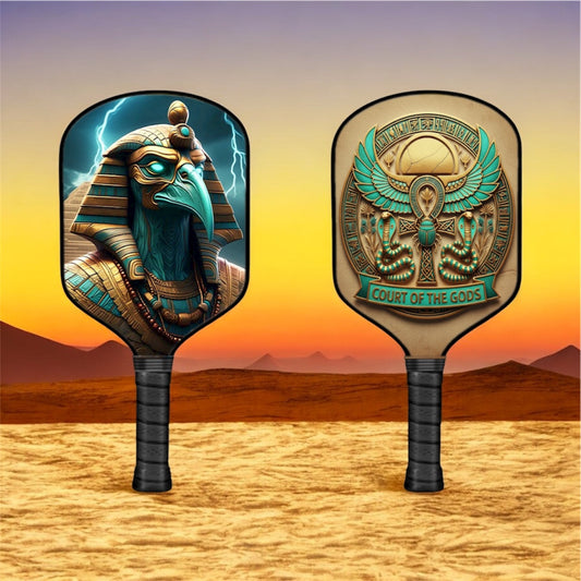 Pickleball paddle with teal Egyptian Thoth face graphic on black paddle face