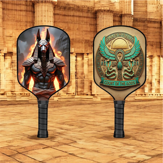 Anubis-themed pickleball paddle with full-color face art and black textured grip