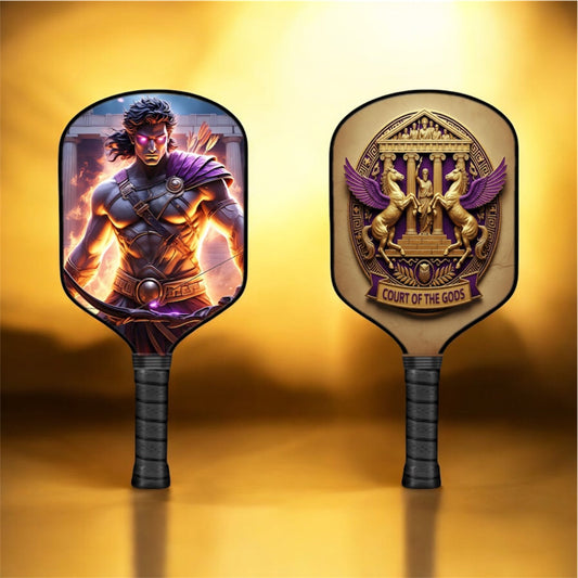Pickleball paddle with dual myth artwork and black grip