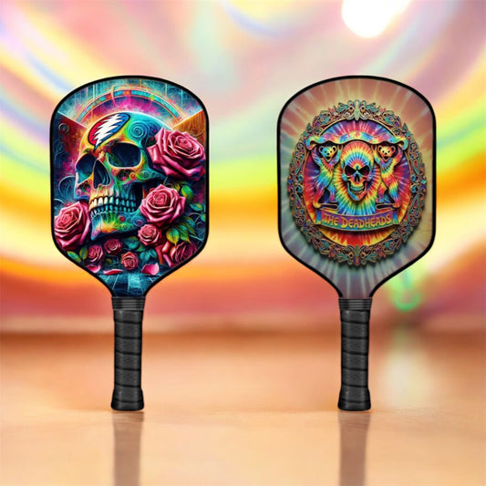 Pickleball paddle with black handle and colorful skull-and-roses Stealie graphic