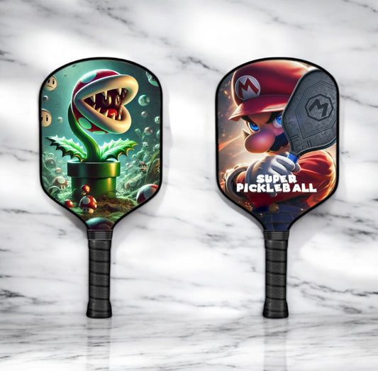 Pickleball paddles featuring green piranha plant and Mario-style graphics, with textured grips