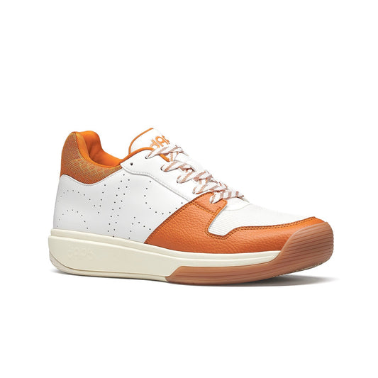 Mid pickleball shoe, white with burnt-orange panels and orange lace accents