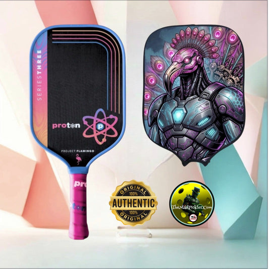 Elongated pickleball paddle with blue edge, pink grip, and flamingo artwork cover