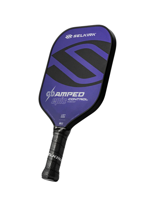 Selkirk AMPED pickleball paddle in purple and black with textured grip handle