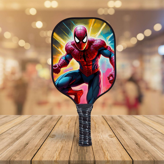 Spiderman-themed pickleball paddle with red-and-blue character artwork