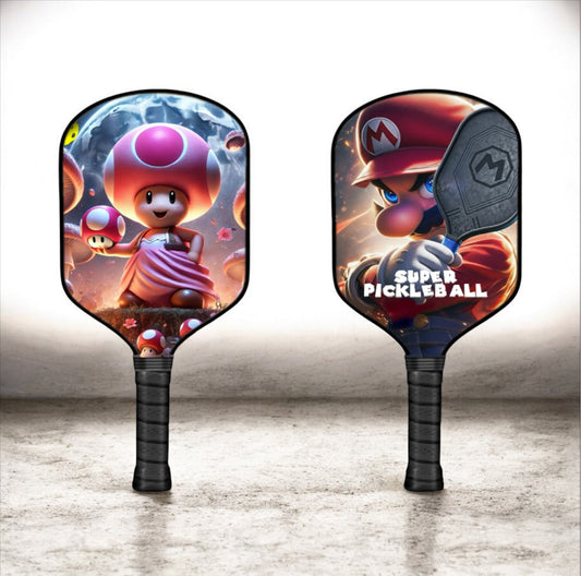 Toadette-themed pickleball paddle with colorful character face and black grip, front view