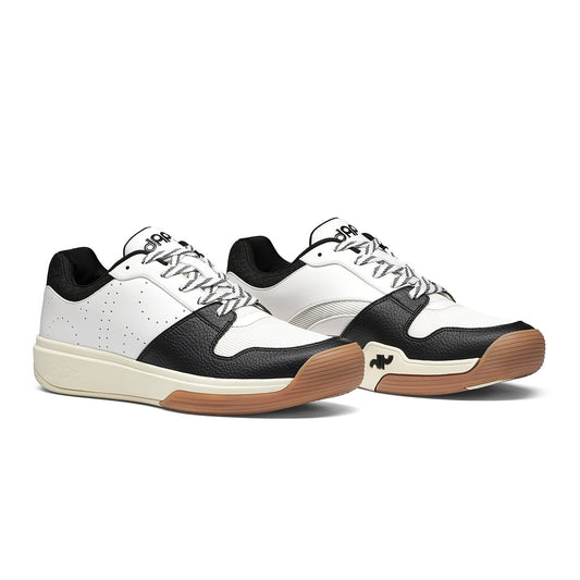 Pair of men's low-top black/white pickleball shoes, lace-up, gum sole
