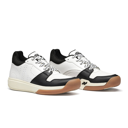 Men's mid pickleball shoes, black and white lace-up uppers, gum rubber soles.